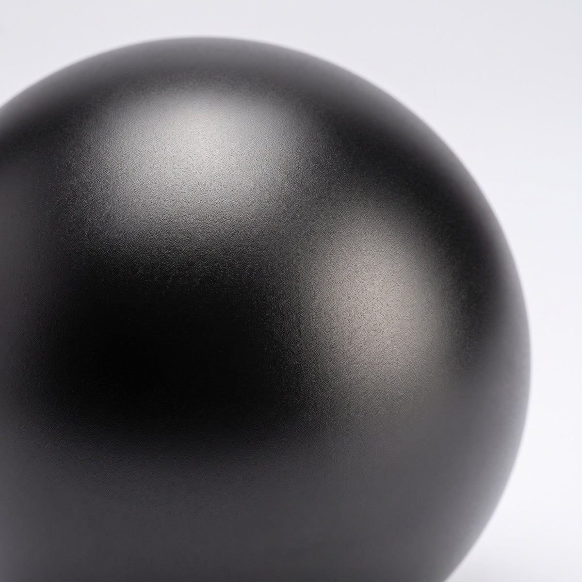 Close-up of the smooth black satin finish