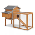 Wooden chicken coop with run, front three-quarter view